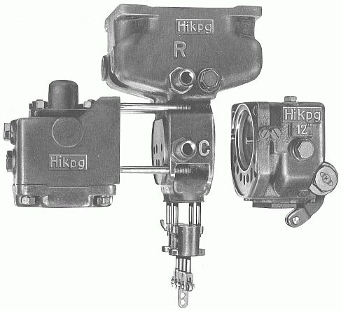 Das Steuerventil Hikp1 mit seinen einzelnen Baugruppen: Ventilträger mit A-Kammer (oben), Nebensteuerventil (links), Hauptsteuerventil (rechts) und Löseventil (unten).